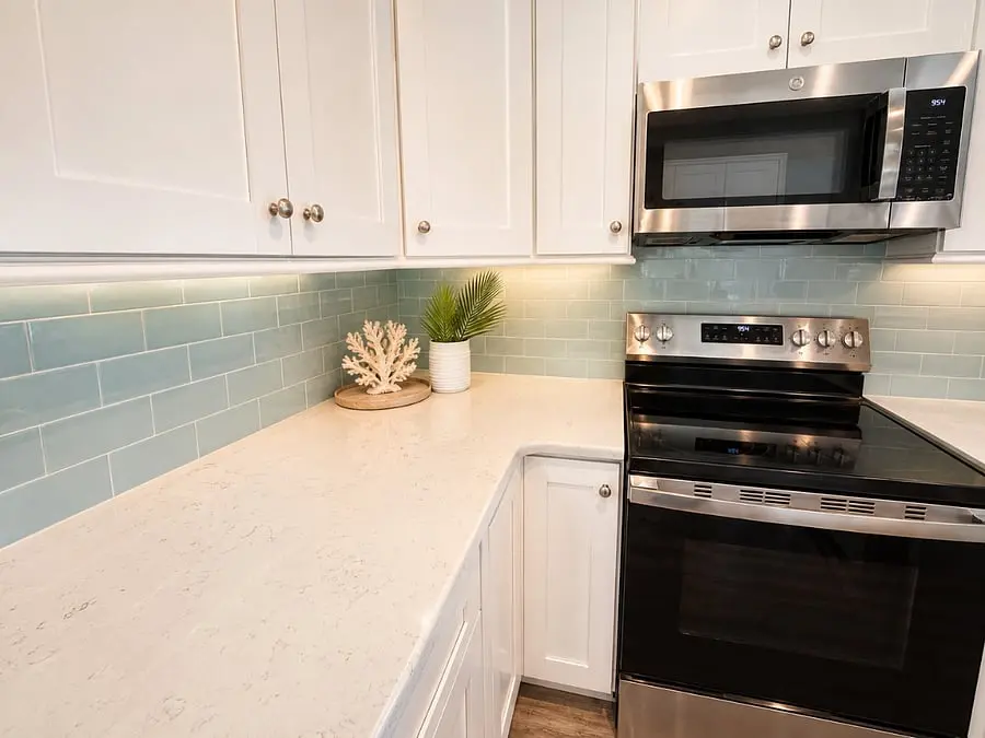Full kitchen with range and microwave at Aqua Paradise, Islamorada, Florida Keys