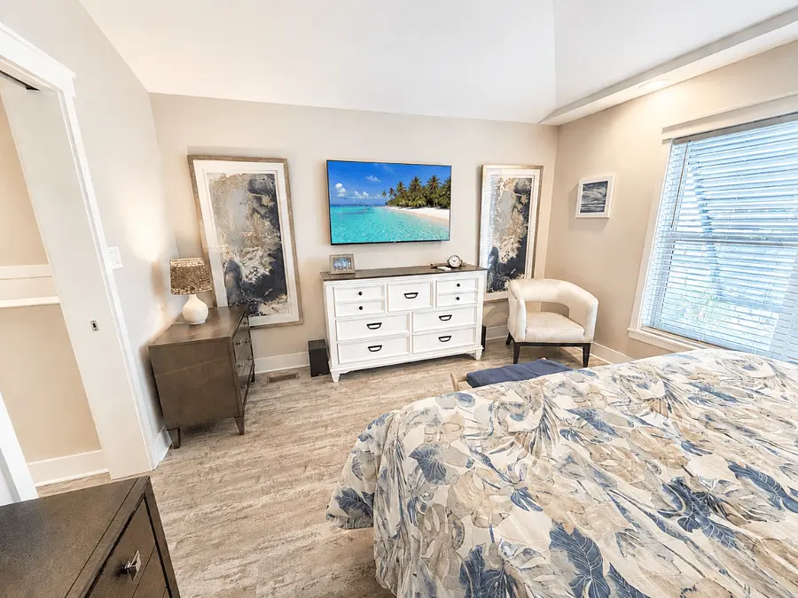 Primary bedroom with smart TV at Aqua Paradise, Islamorada, Florida Keys