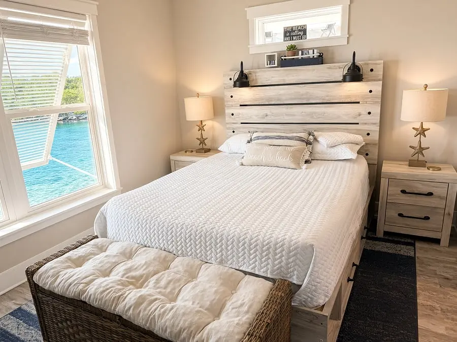 Queen bedroom with water view at VellaMar, Islamorada, Florida Keys